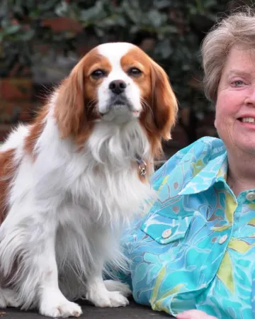 A therapy dog with her handler
